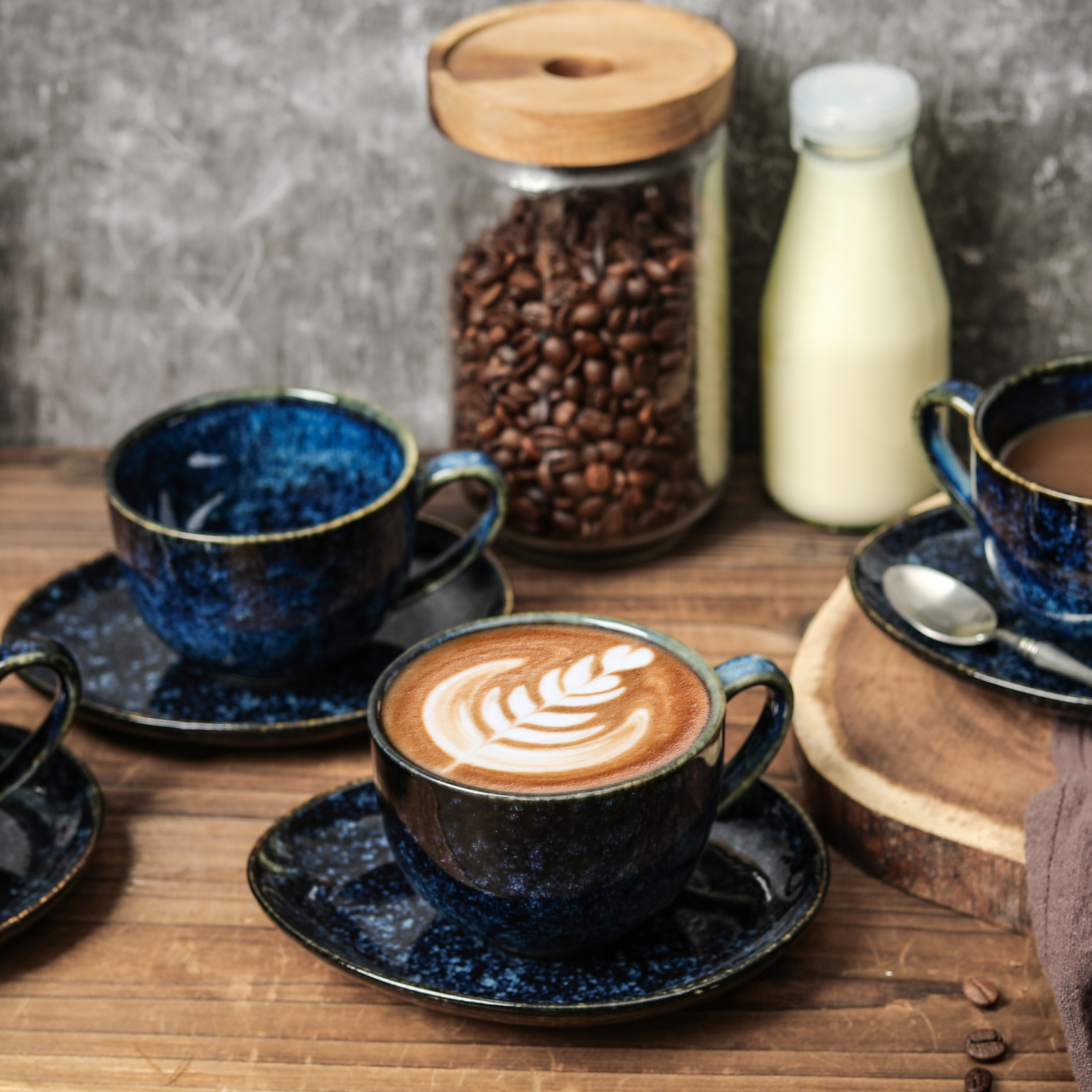 Set of different cute cups with coffee - americano, cappuccino