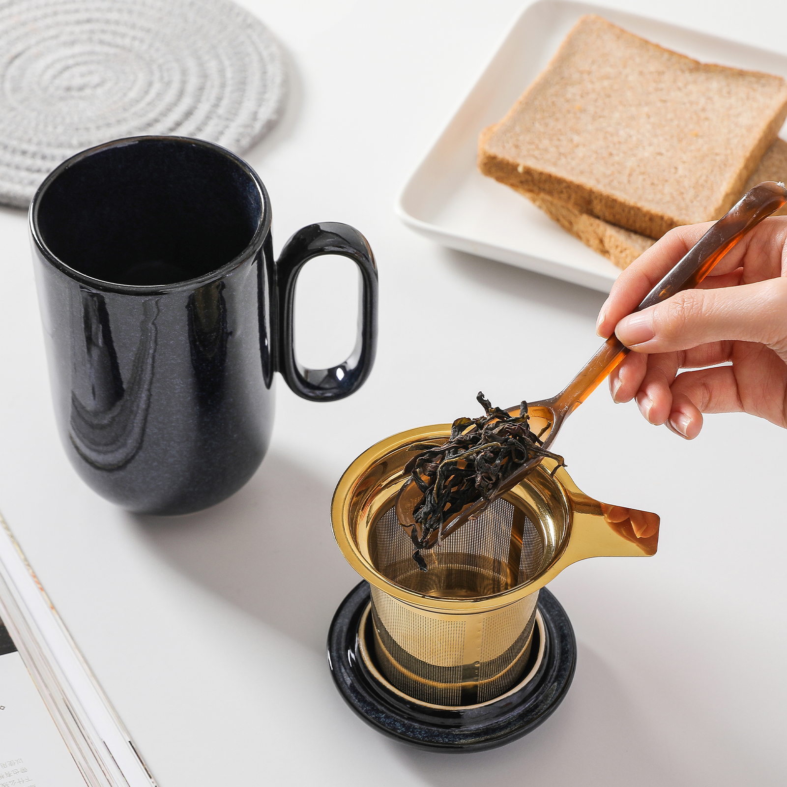 https://www.vicrays.com/wp-content/uploads/2022/07/3-ceramic-tea-mug-with-Spoon-and-Lid.jpg